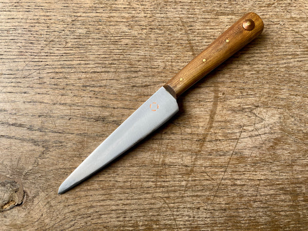 Eating knife with copper rivet