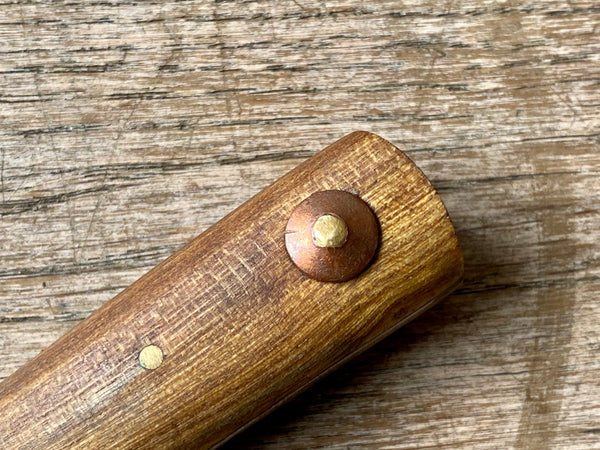 Eating knife with copper rivet